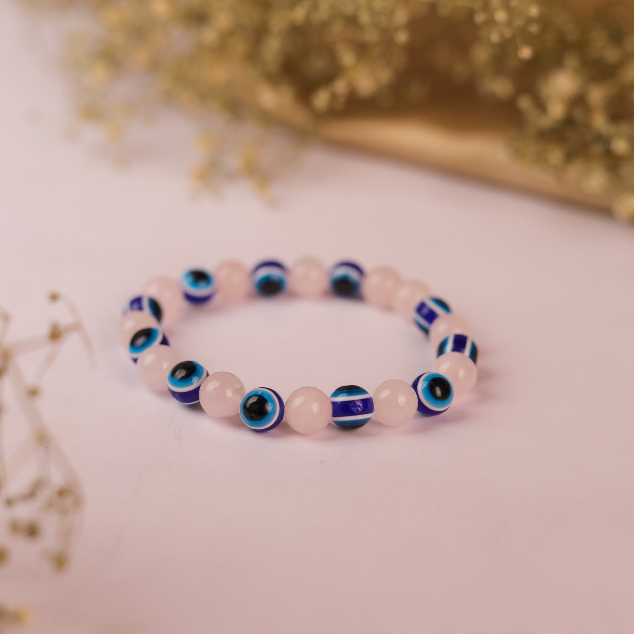 NATURAL ROSE QUARTZ + EVIL EYE BRACELET