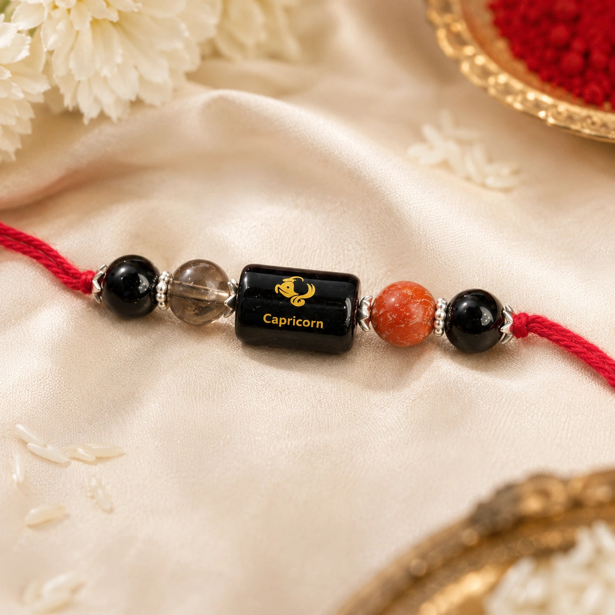 Makar Rashi Capricorn Crystal Rakhi with Black Tourmaline, Red Jasper and Smoky Quartz – natural certified crystal rakhi by Bellarosa Gems
