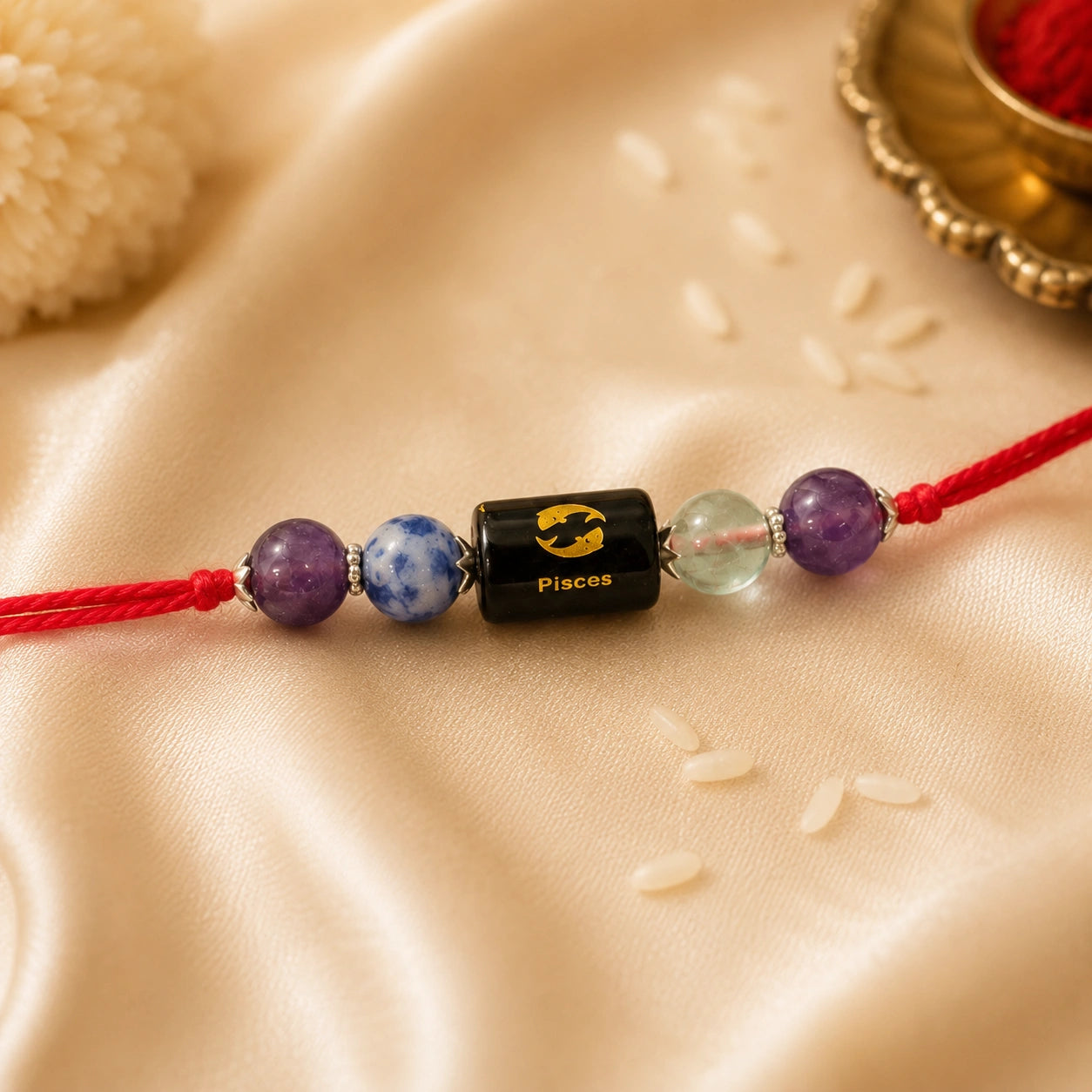 Meen Rashi Pisces Crystal Rakhi with Amethyst, Fluorite and Sodalite – natural certified crystal rakhi by Bellarosa Gems