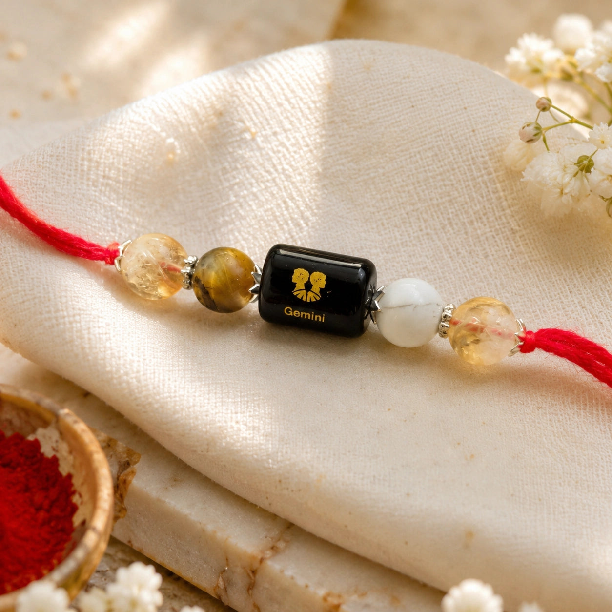 Mithun Rashi Gemini Crystal Rakhi with Citrine, Tiger Eye and Howlite – natural certified crystal rakhi by Bellarosa Gems