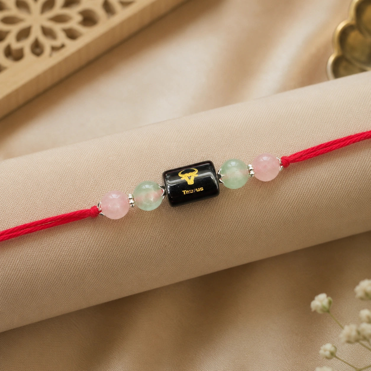 Vrishabh Rashi Taurus Crystal Rakhi with Rose Quartz, Green Aventurine and Fluorite – natural certified crystal rakhi by Bellarosa Gems