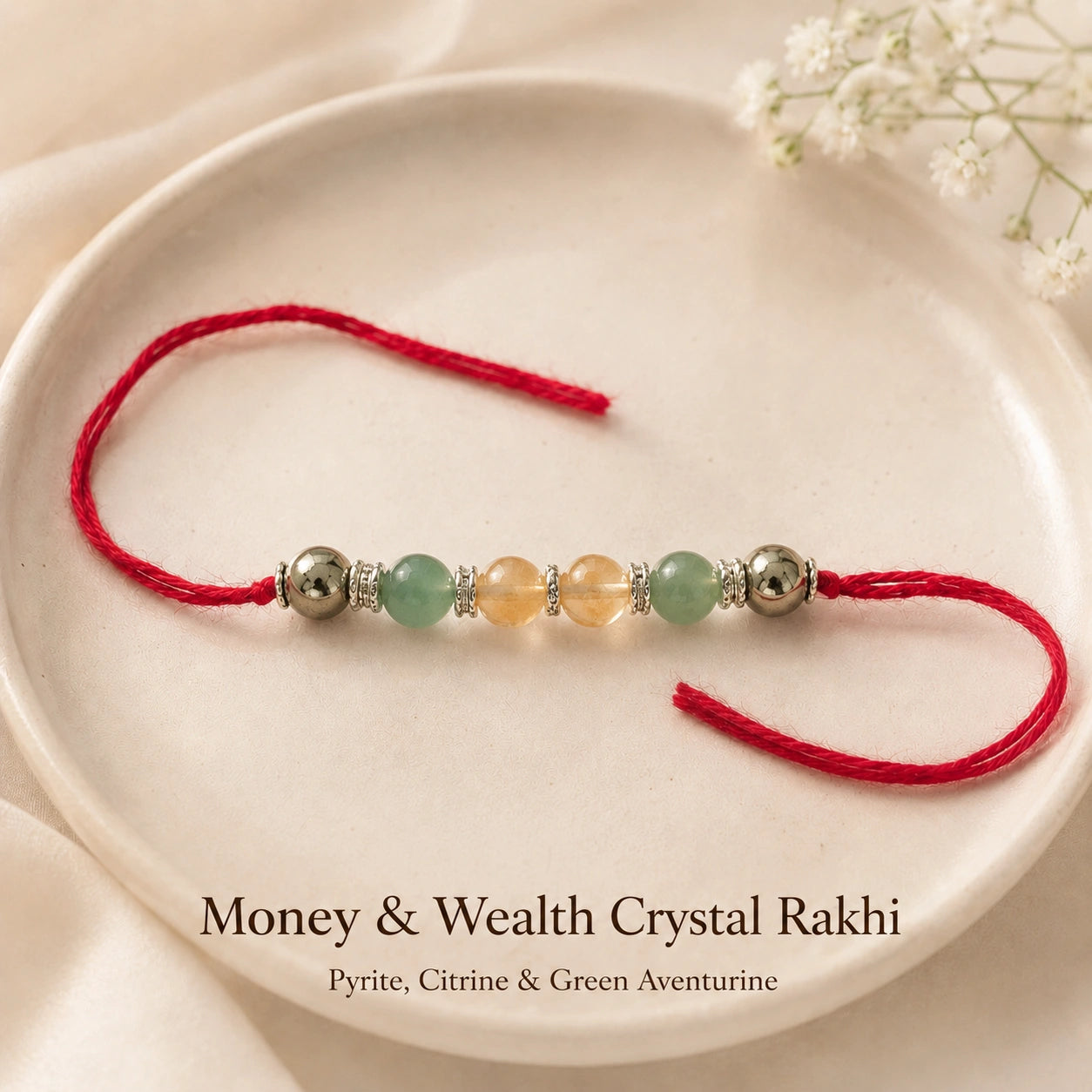 Natural certified Money & Wealth Crystal Rakhi for prosperity by Bellarosa Gems