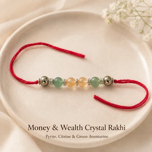Natural certified Money & Wealth Crystal Rakhi for prosperity by Bellarosa Gems