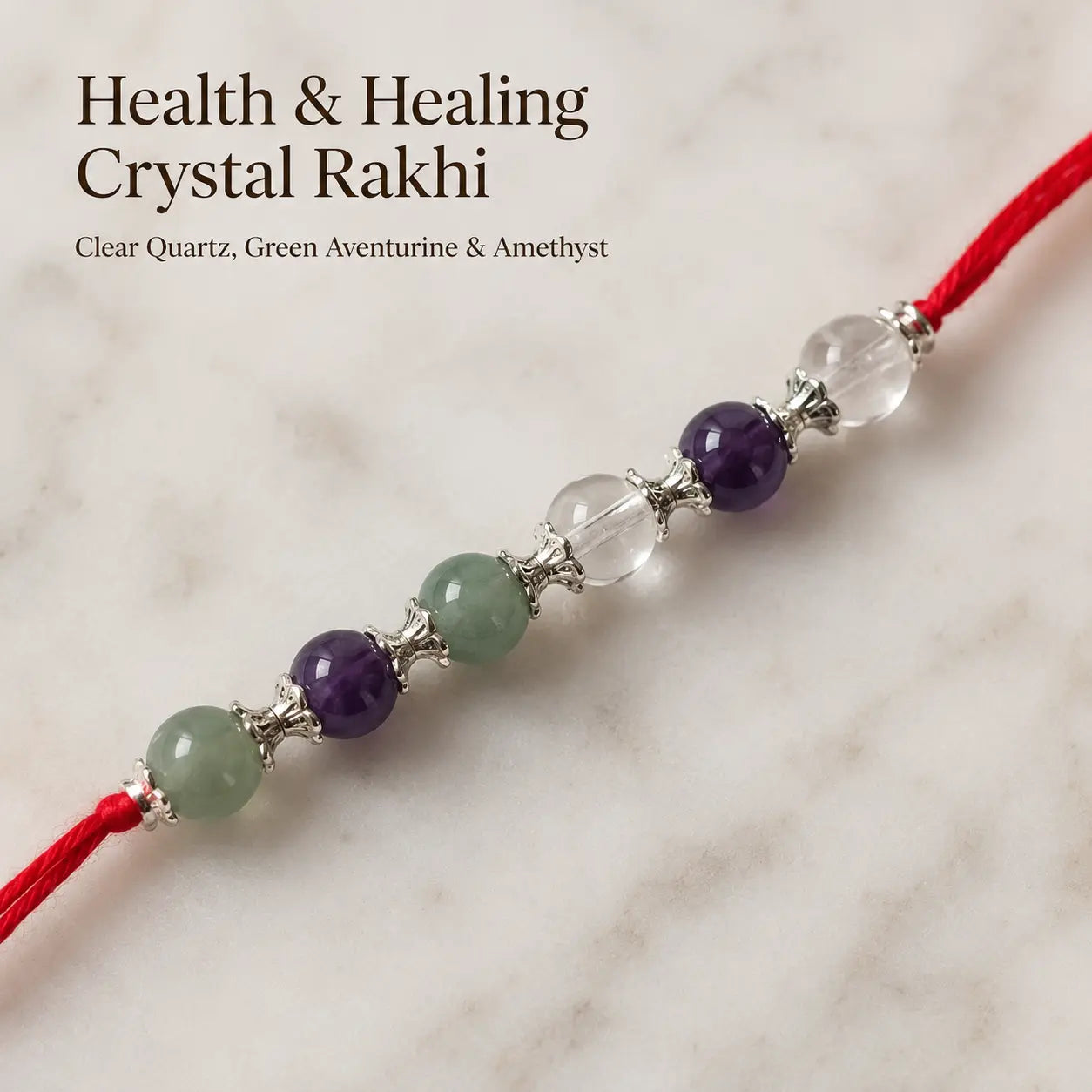 Health & Healing Crystal Rakhi with Clear Quartz and Amethyst beside festive diya – Bellarosa Gems