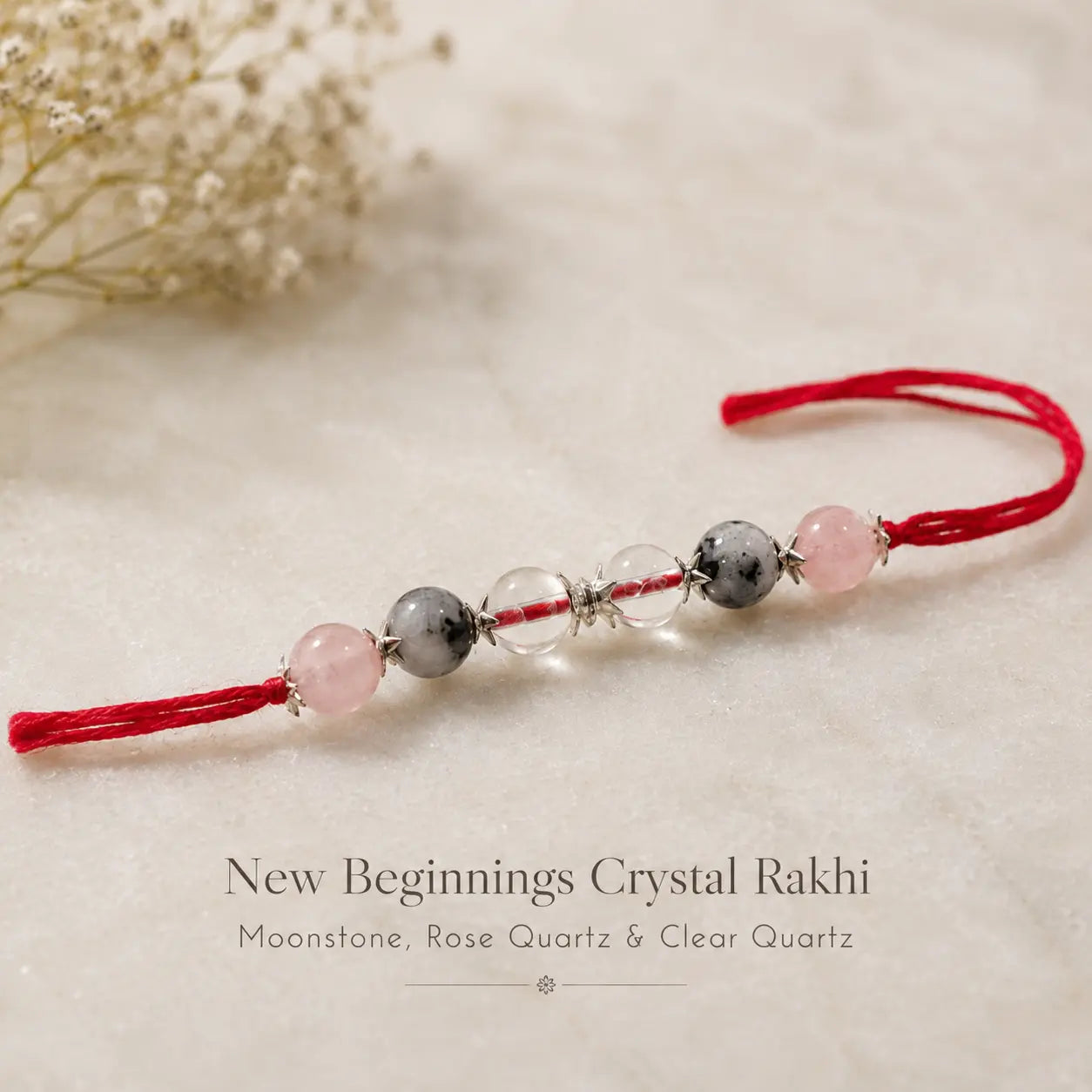 New Beginnings Crystal Rakhi close-up of Moonstone, Rose Quartz and Clear Quartz – Bellarosa Gems