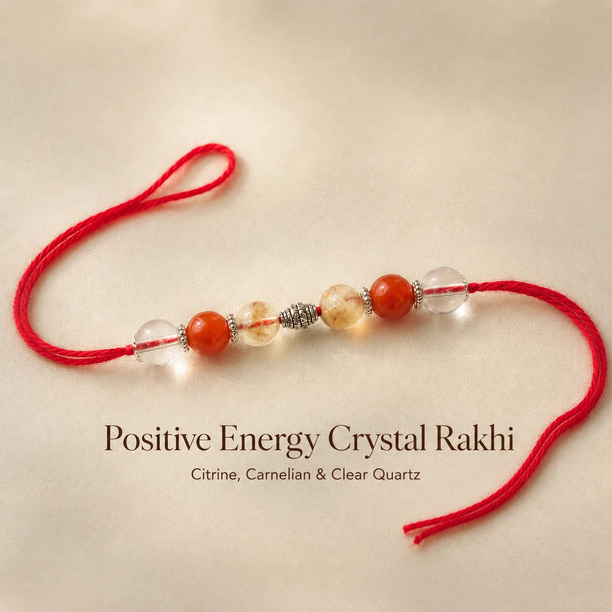 Positive Energy Crystal Rakhi close-up of Citrine and Clear Quartz – Bellarosa Gems