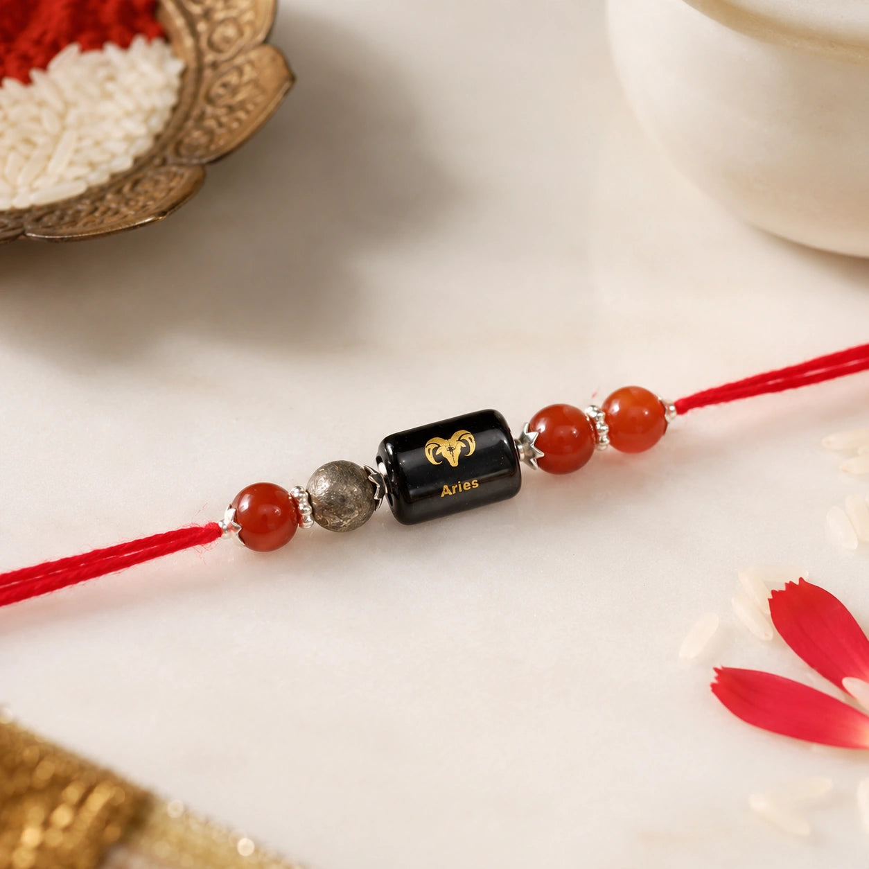 Mesh Rashi Aries Crystal Rakhi with Carnelian, Red Jasper and Pyrite – natural certified crystal rakhi by Bellarosa Gems
