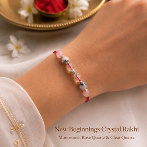 New Beginnings Crystal Rakhi with Moonstone and Rose Quartz worn on wrist – Bellarosa Gems